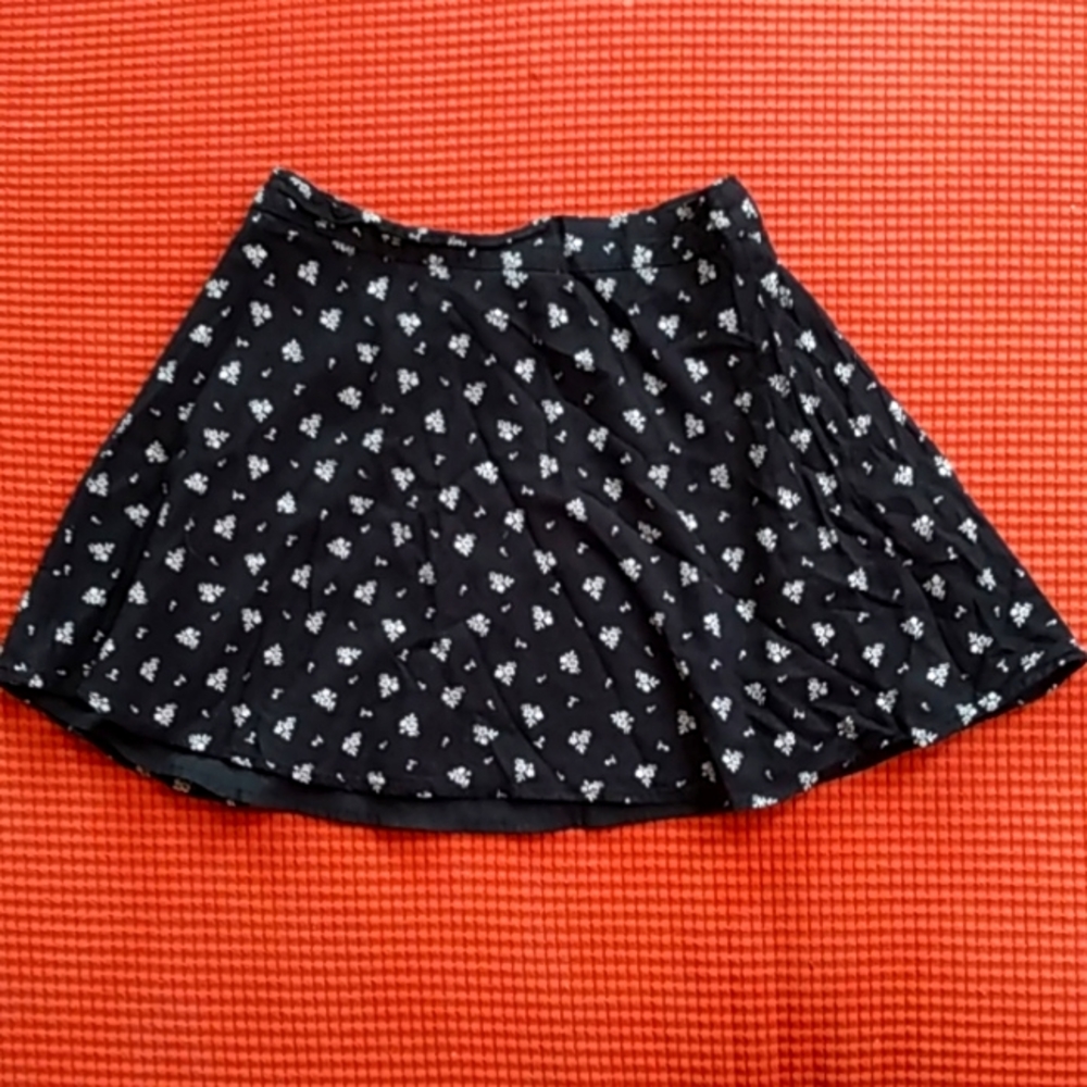A black skirt with white flowers